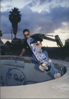 Jimmy Moore beans to fakie while the hungry backhoe patiently awaits its meal